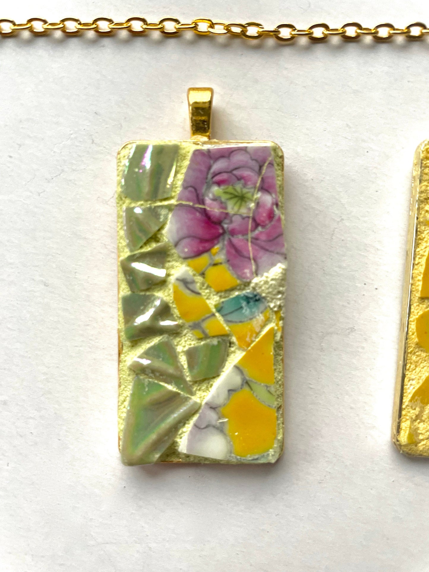 One-of-a-kind mosaic necklaces made from broken vintage dishes