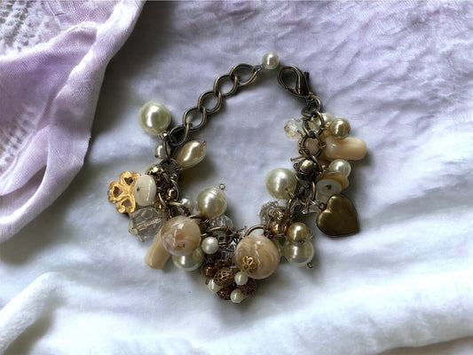 Vintage charm bracelet - faux pearls, glass, crystals, buttons and mixed materials