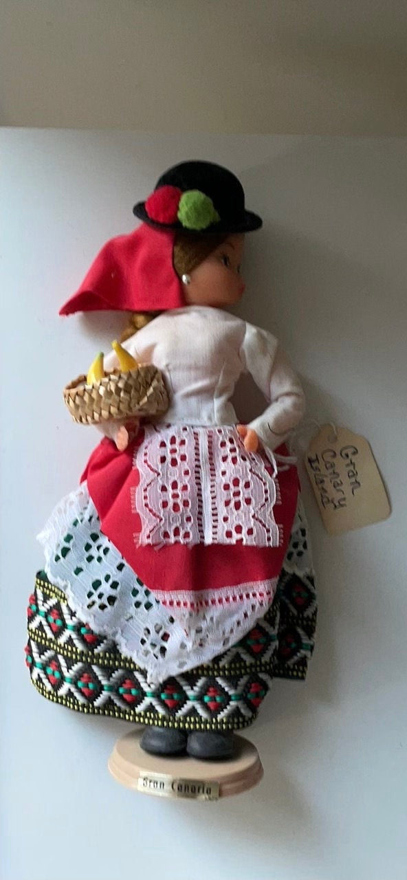 Vintage signed Muneca Artesana Beibi doll figurine - Made in Spain - holding wicker basket with miniature fruit