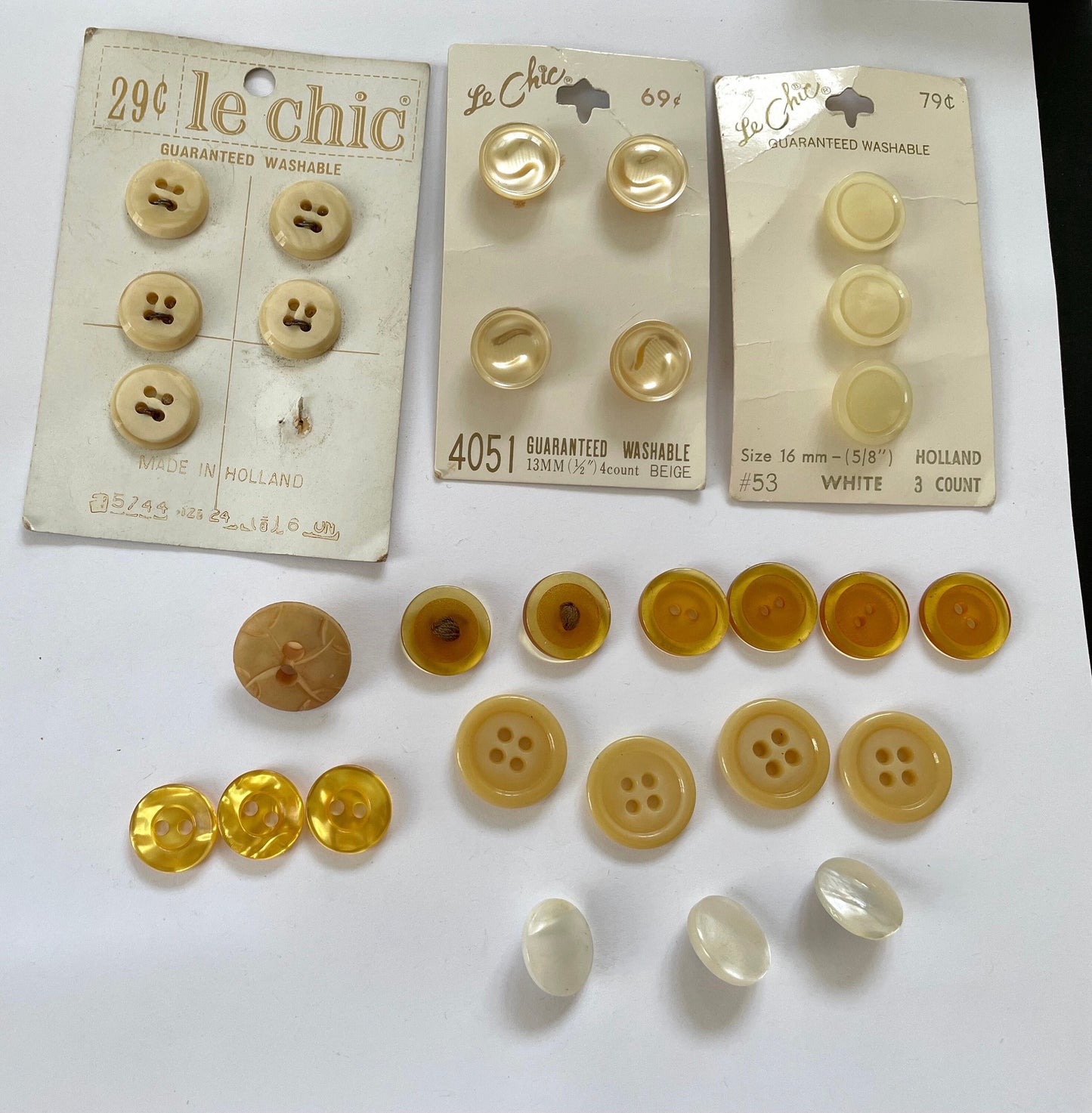 Lot of vintage buttons - from Holland and elsewhere - shades of yellow, gold and cream