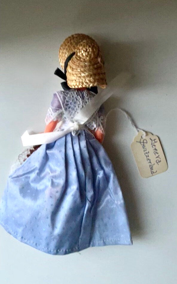 Vintage collectible handmade Geneva, Switzerland doll figurine - eyes open and close