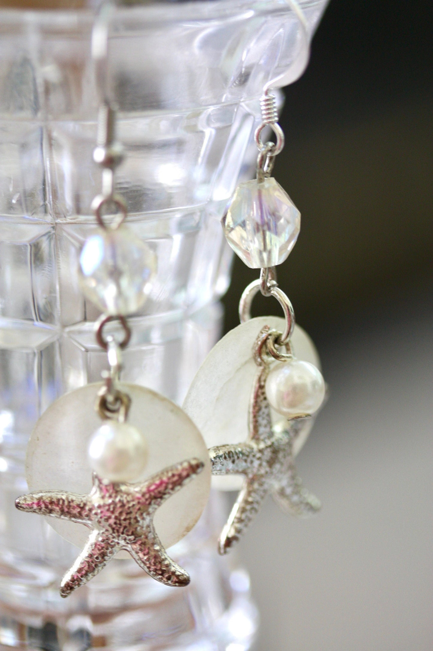 Capiz shell, faux pearl and silvertone starfish beach themed dangle earrings