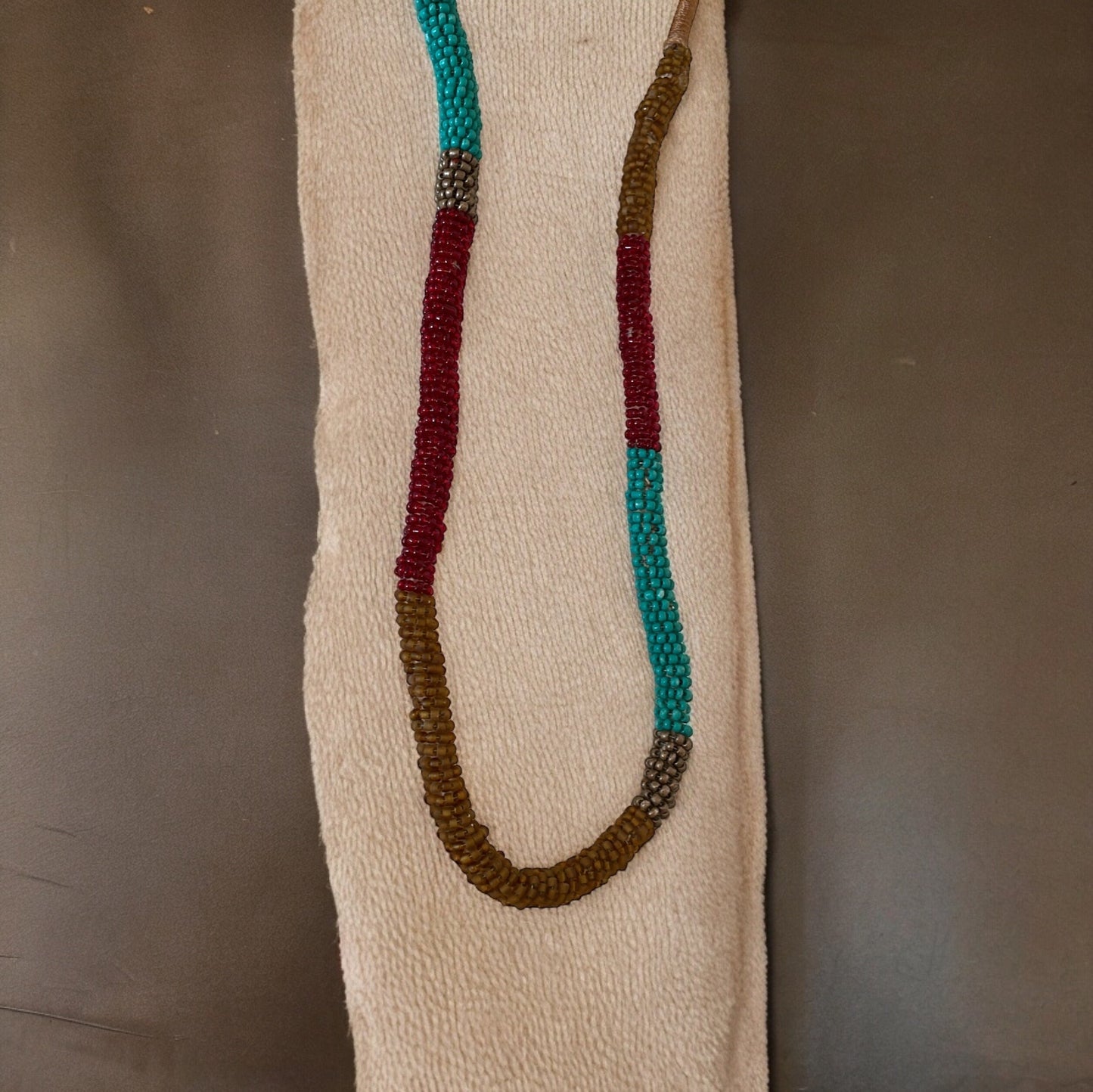 Stunning silk wrapped earth tone beaded long vintage necklace