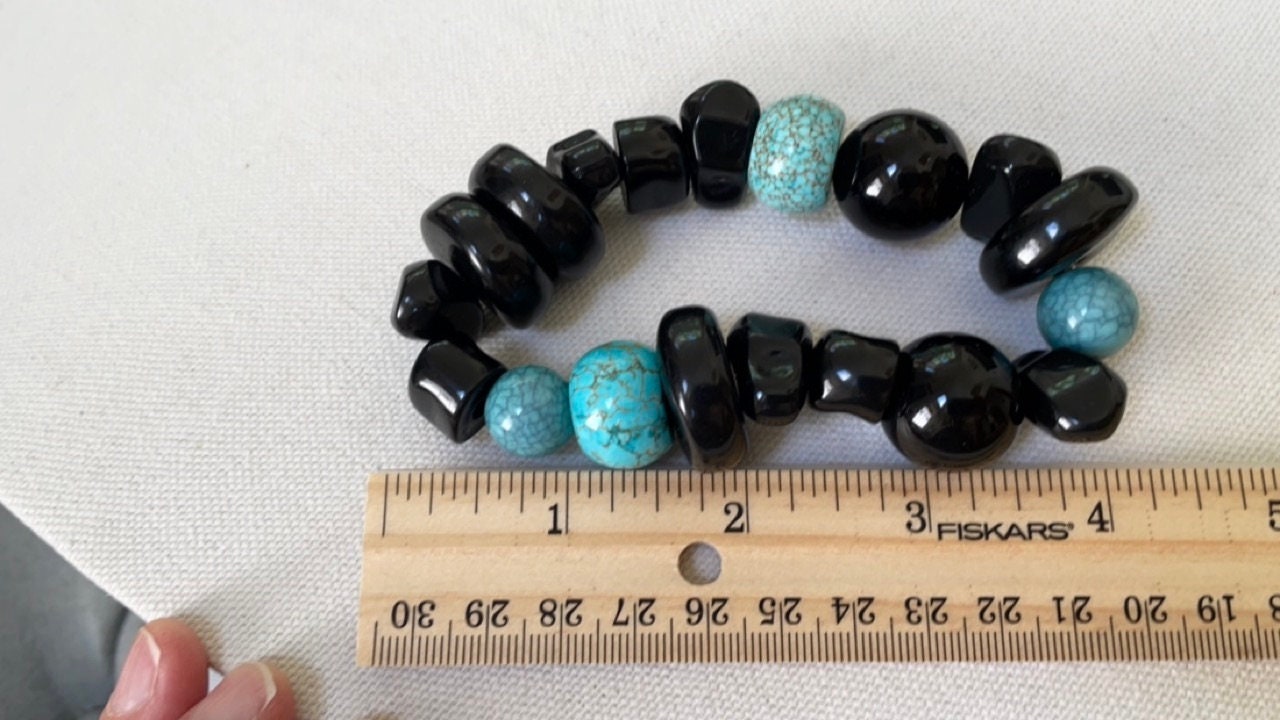 Stunning vintage mixed sizes and shapes of black and faux turquoise beaded bracelet