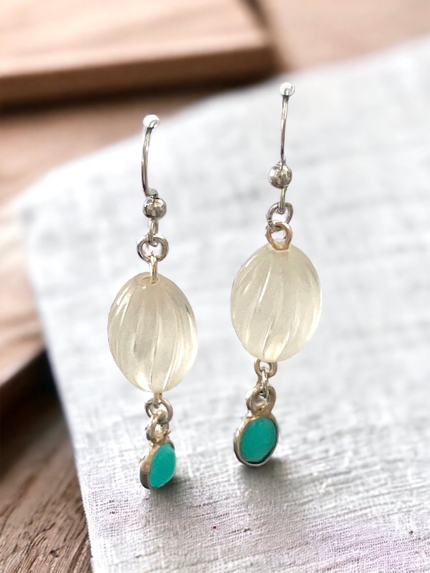 Long dangle earrings made of both new and vintage components - swirled frosted white with blue dangles