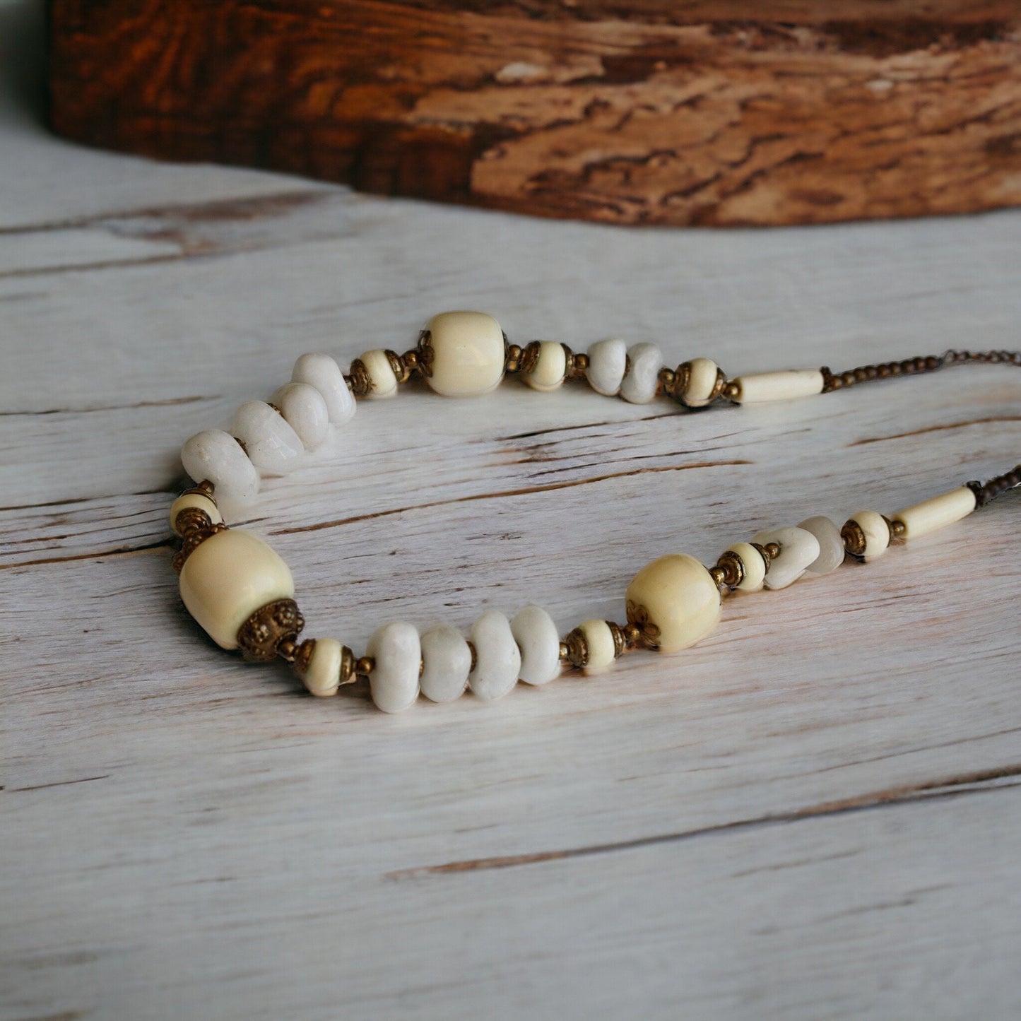 Unique vintage necklace - drilled stones, metal spacers and horn style varied shaped beads