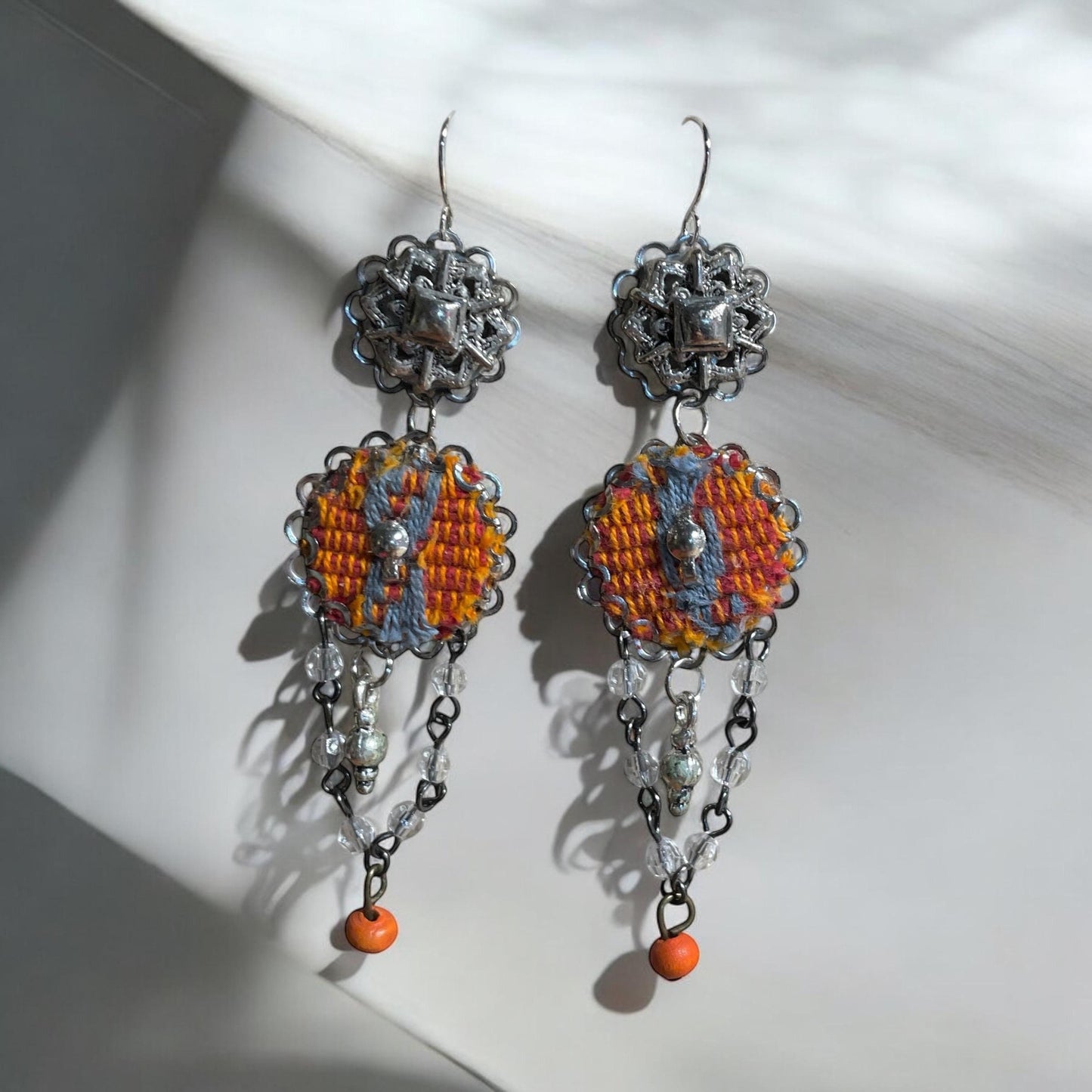 Orange and gray mixed media collage earrings with mixed metals, fabric, crystal and wood; Sterling silver ear wires
