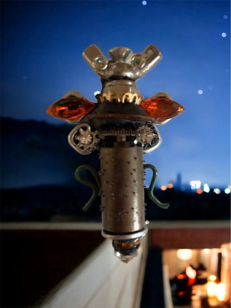Meet "Scout" , a mixed material insect made of parts of a vintage Swiss music box, along with nails, screws, bolts - pin or necklace pendant