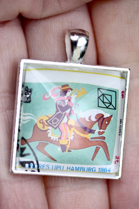 Necklace pendants made from genuine vintage and antique postage stamps from around the world - Australia, Argentina, Afghanistan, folk art