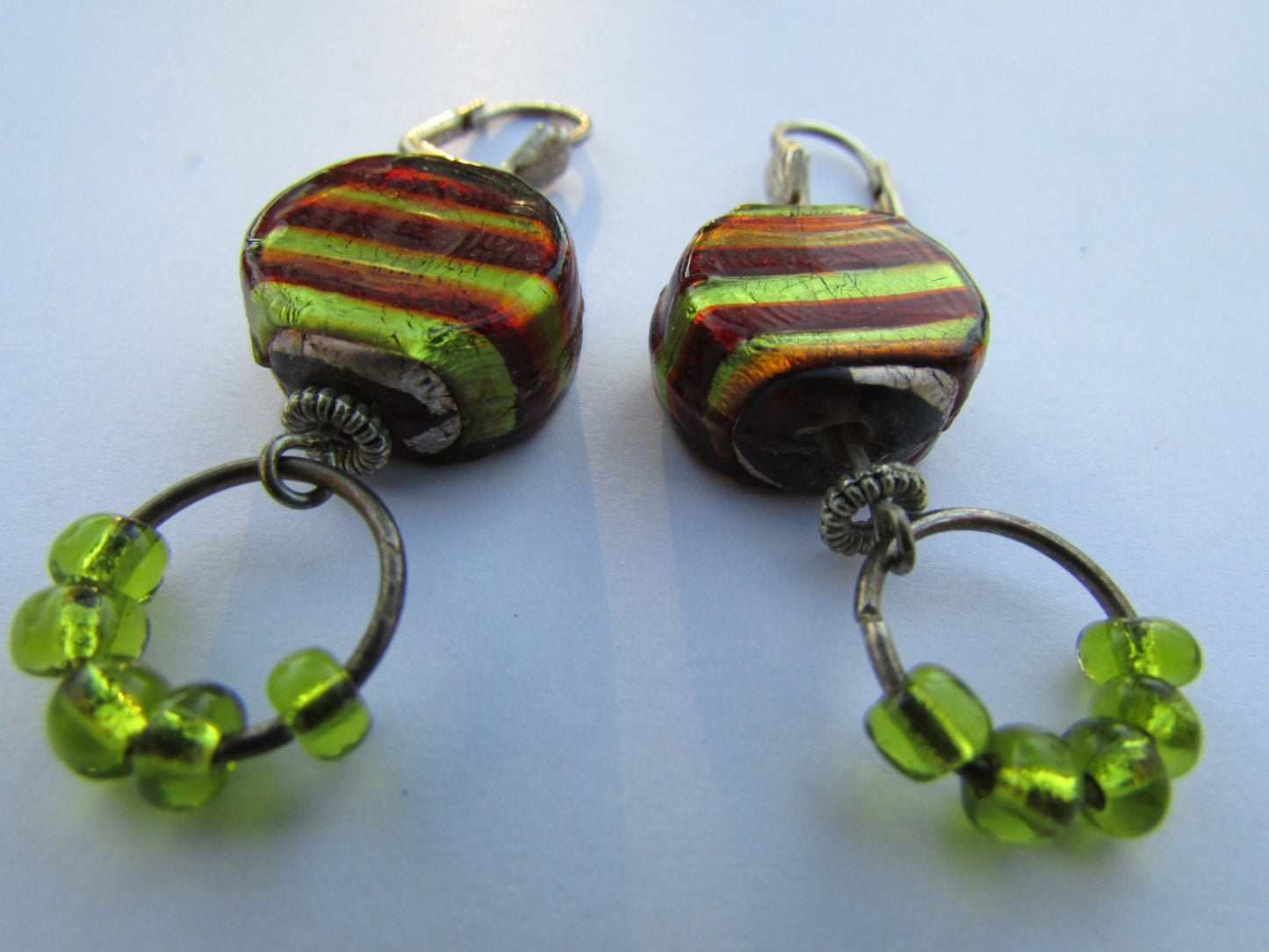Stunning striped artisan glass and lime-toned green glass dangle hoops - vintage artisan earrings