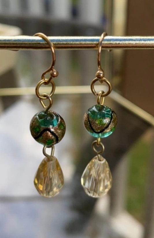 Handmade dangle earrings with green and gold art glass and faceted crystals