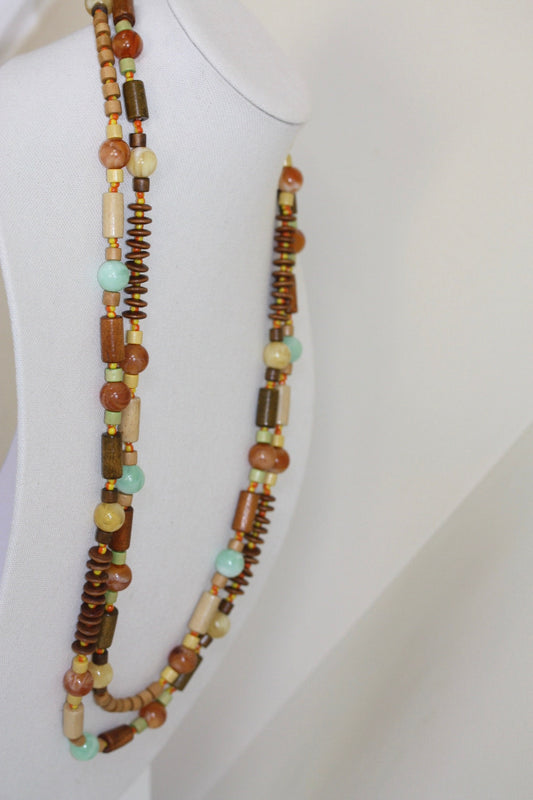 Stunning mixed materials extra long vintage necklace - variety of shapes and sizes of wood, striped glass, resin, seed beads and more
