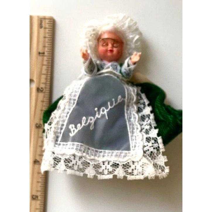 Stunning vintage collectible art baby Doll from Belgium with green velvet dress and lace overlay