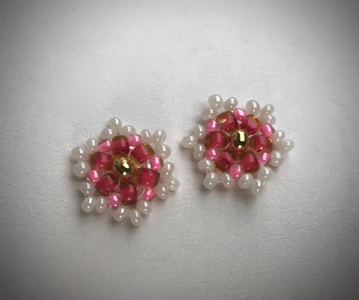 Tiny little hand beaded stud earrings - shades of pink and cream with goldtone center