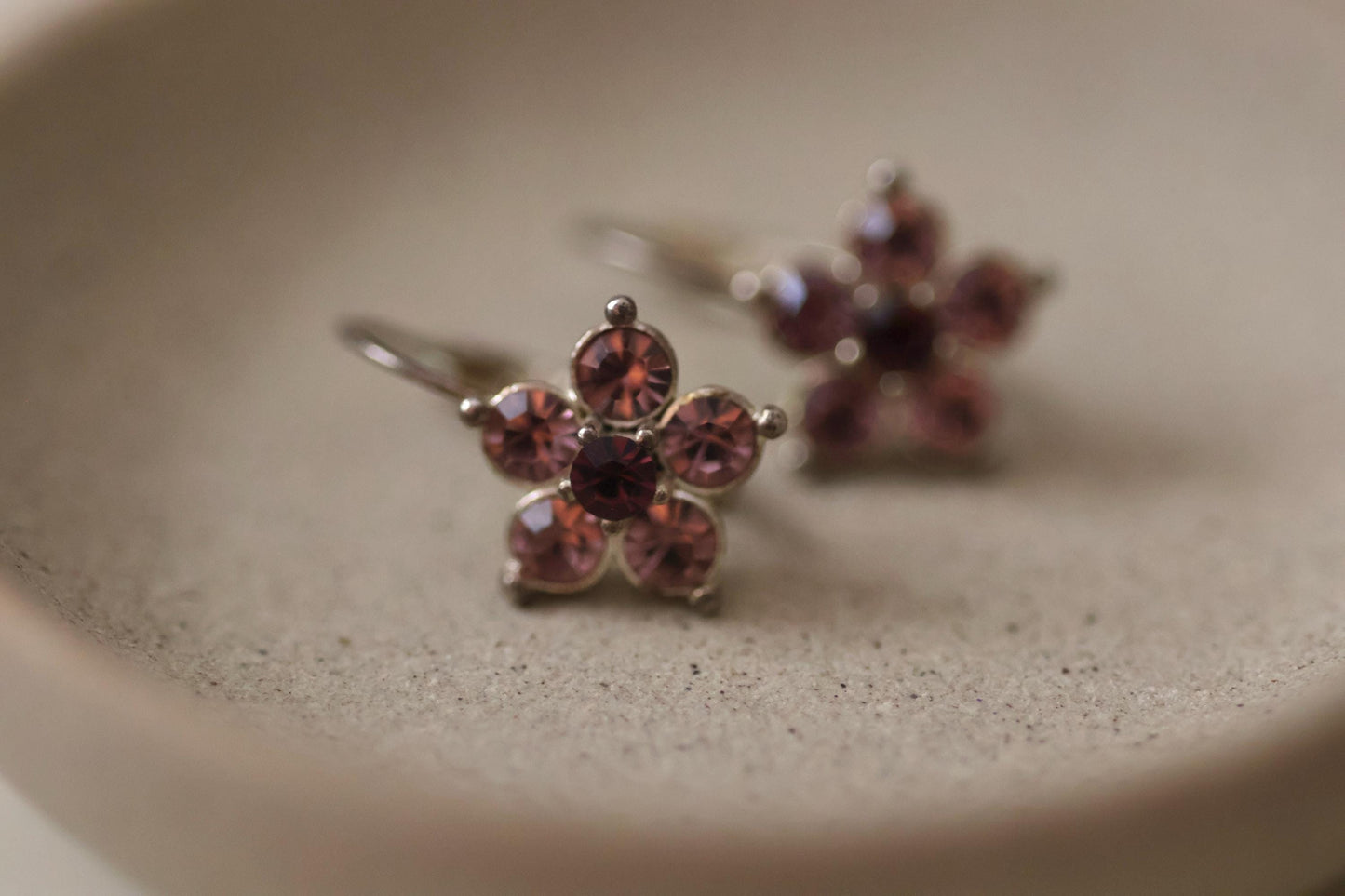 Shades of purple rhinestone flower stunning little vintage dangle earrings - 3/4"