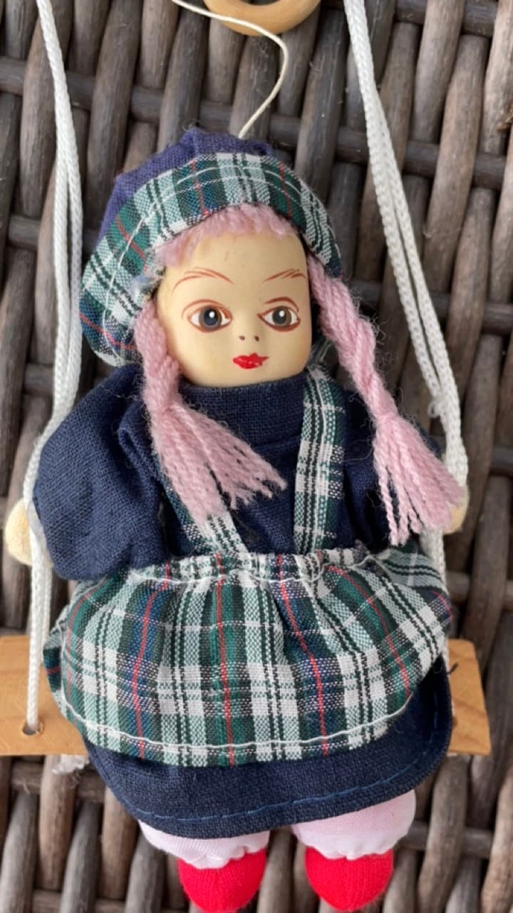 Little porcelain girl doll on swing dangling figurine by Lidco