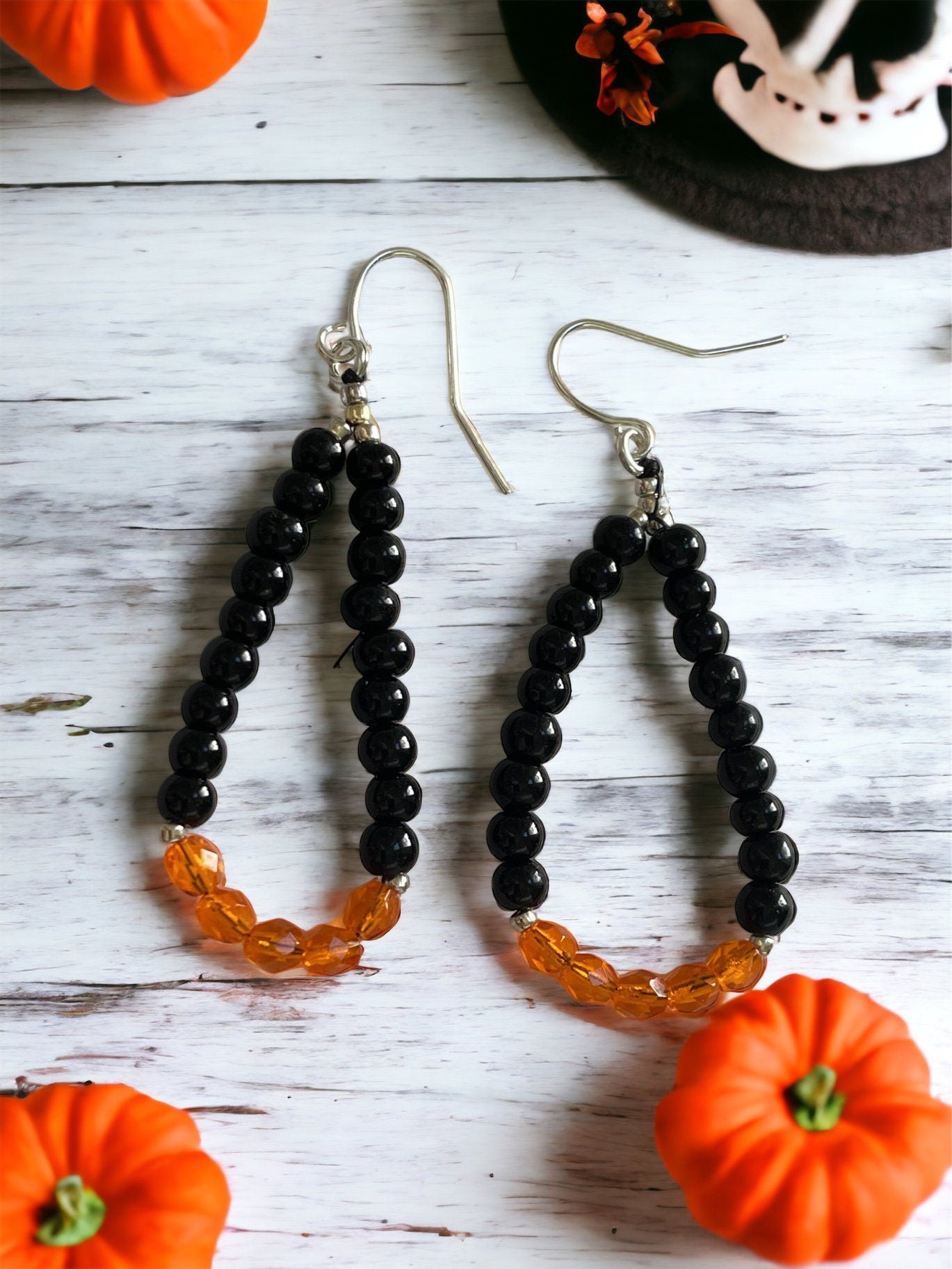 Hand beaded color block dangle hoop earrings - orange and black glass beads - perfect for the fall and Halloween