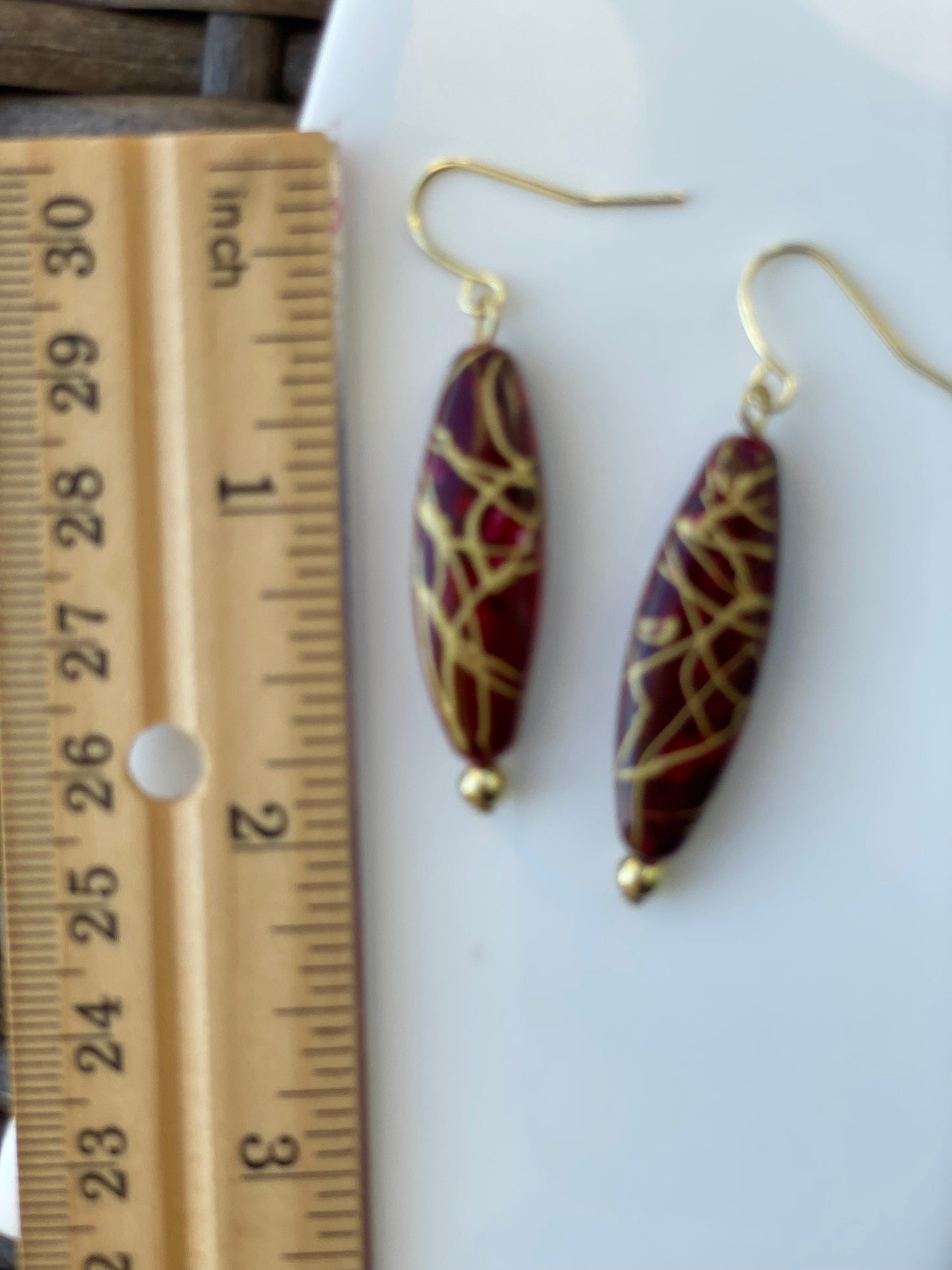Handmade earrings with upcycled vintage red and gold swirled vintage oval dangles - perfect for the Christmas holidays