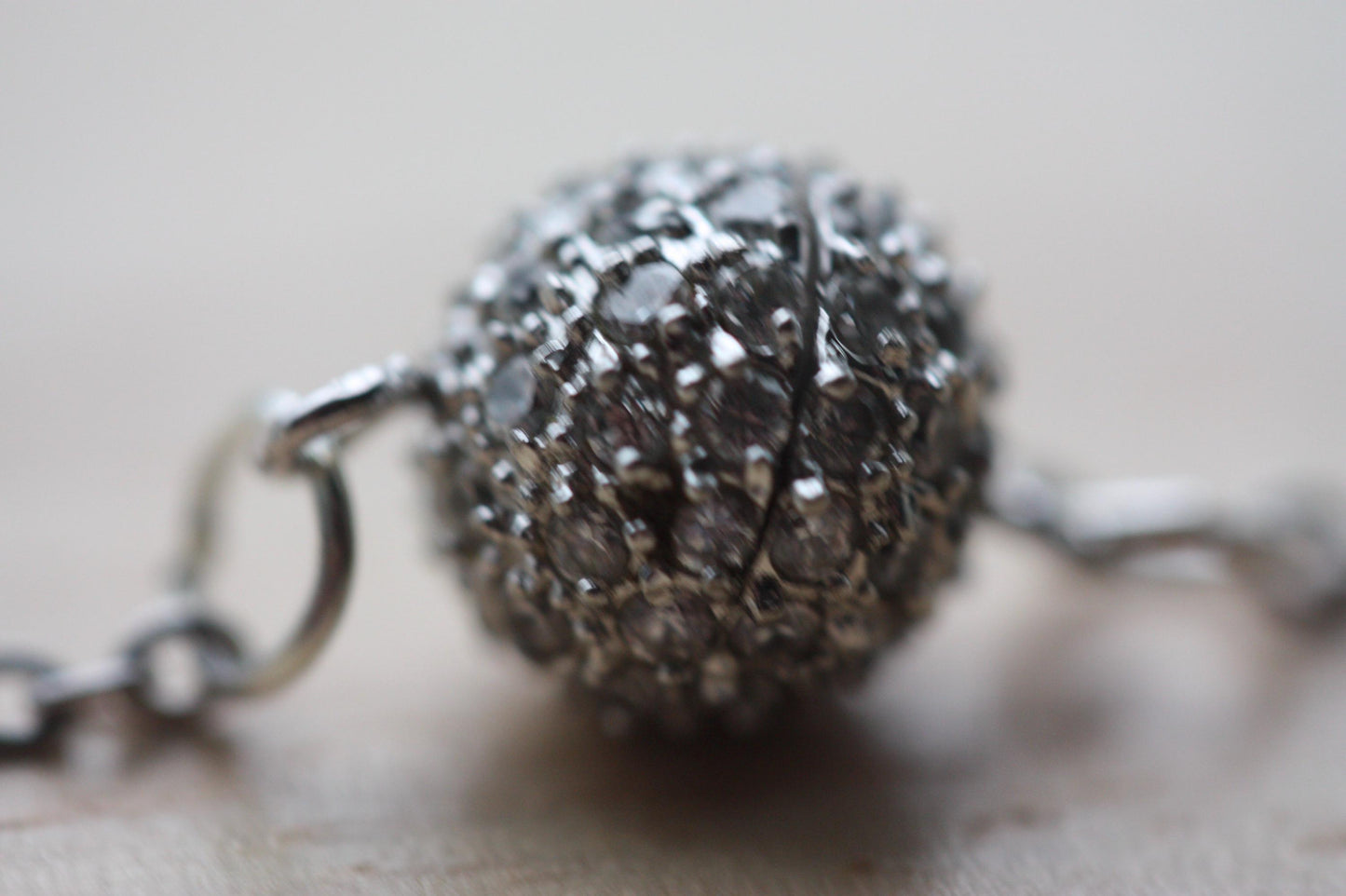 Handmade bracelet made with unique round marcasite ball that is the focal point and also unwinds as the clasp