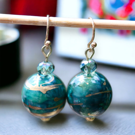 Dangle earrings made of turquoise rondelle crystals and unique turquoise/gold swirled upcycled vintage beads