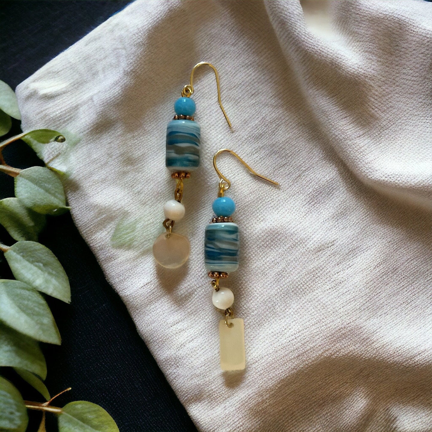 Shades of blue swirled glass with mother of pearl dangles - handmade earrings