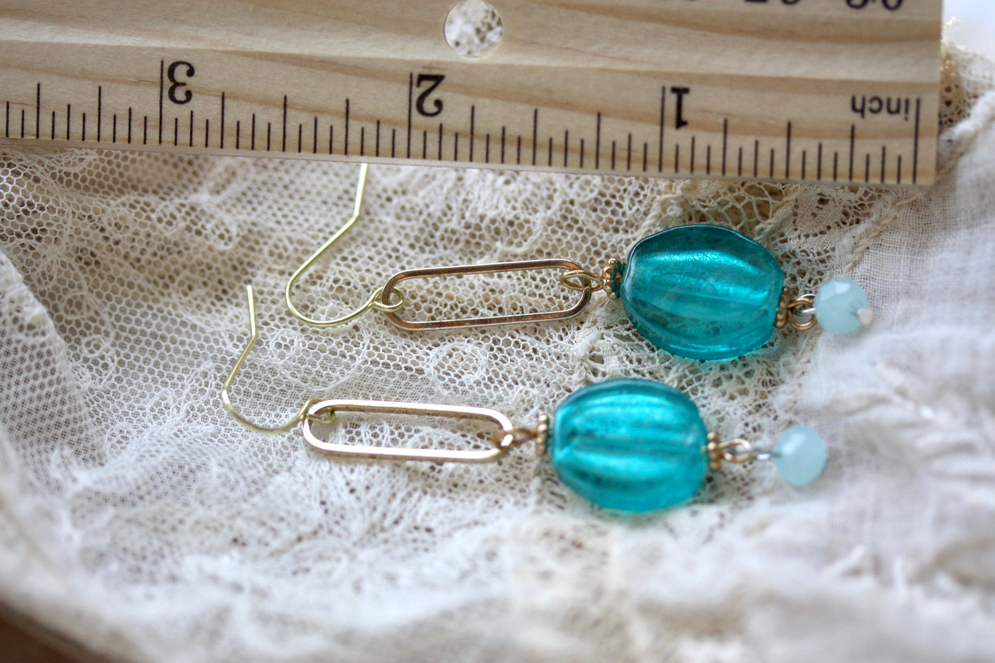 Turquoise glass and gold metal drop earrings