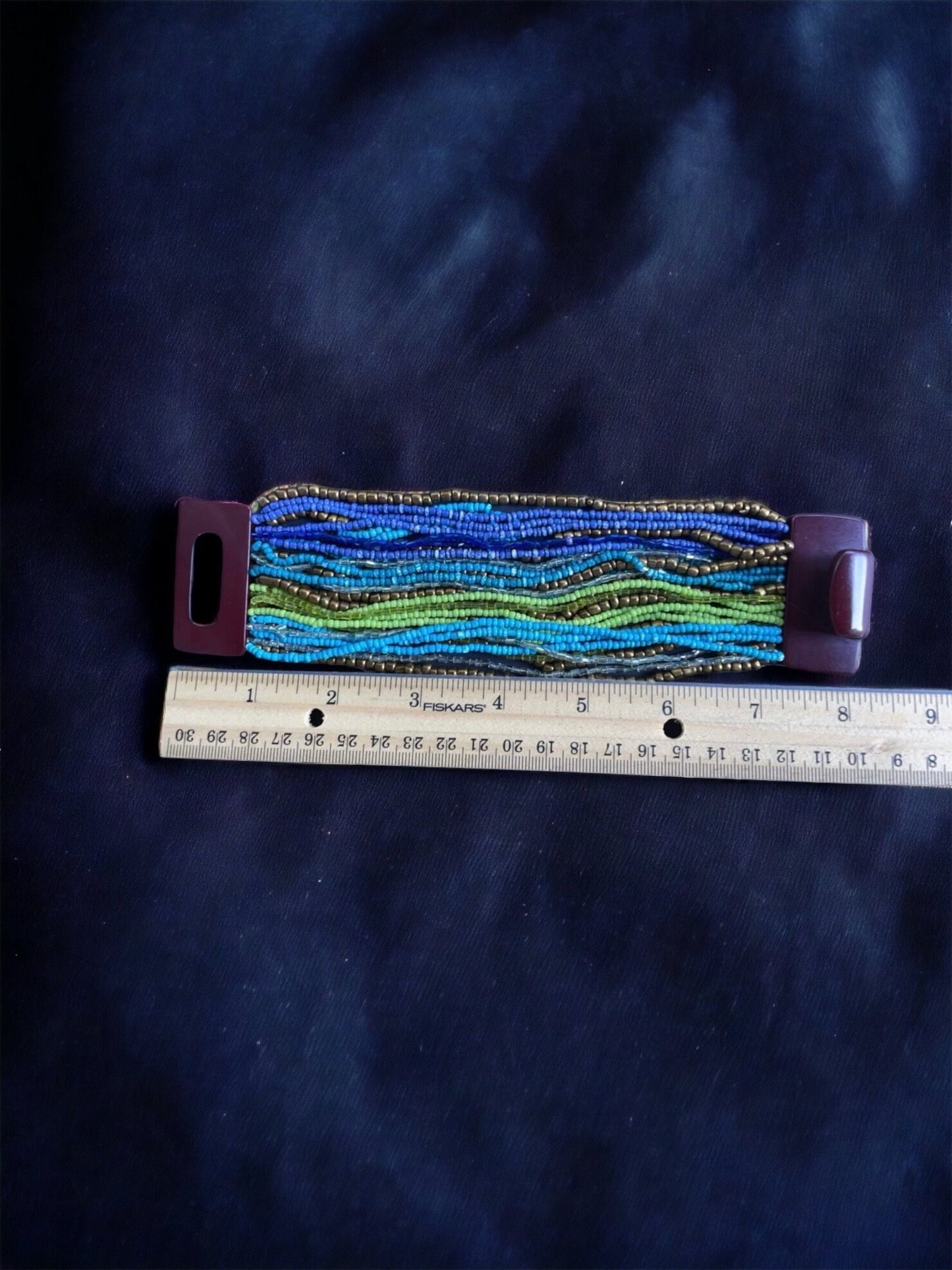 Stunning vintage bracelet - loaded with dozens of strands of tiny glass beads - plastic or bakelite closure?