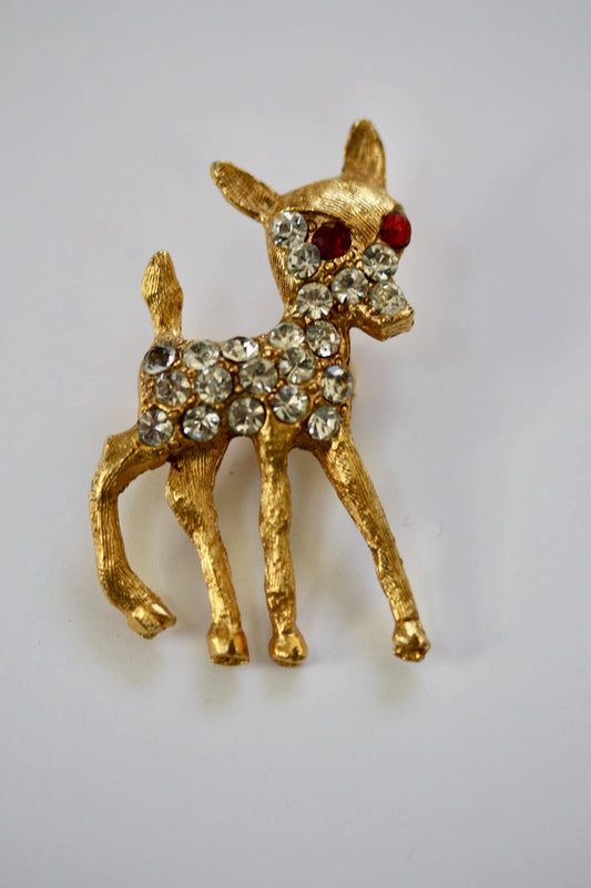 Charming vintage reindeer pin loaded with rhinestones