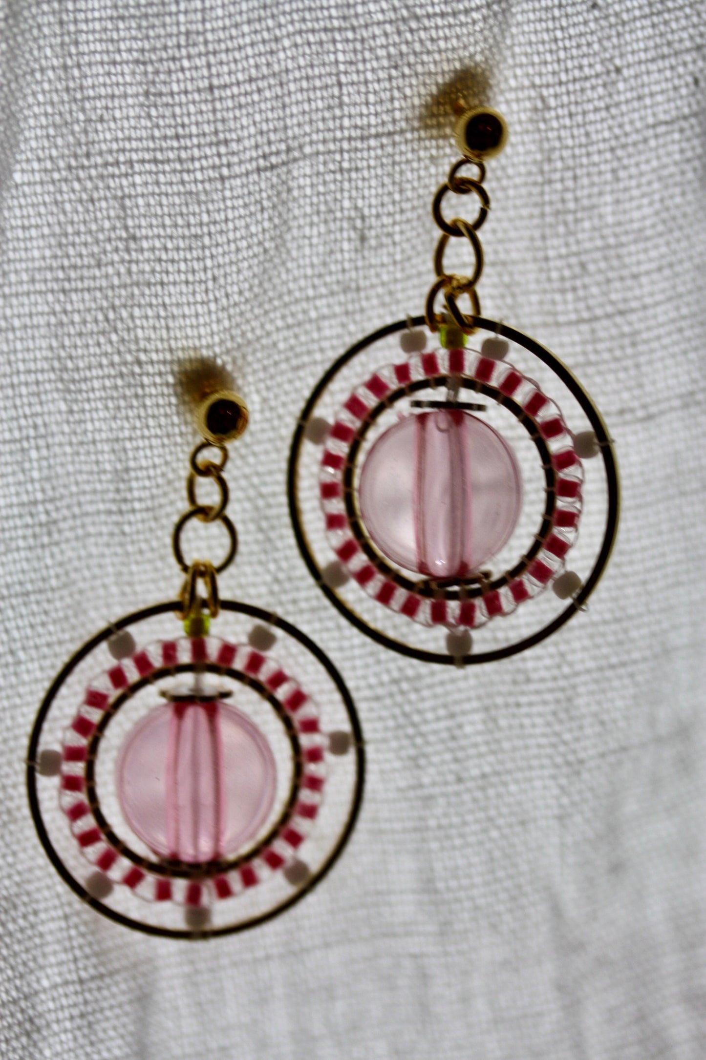 Pink and white intricate beadwork small circular dangle earrings
