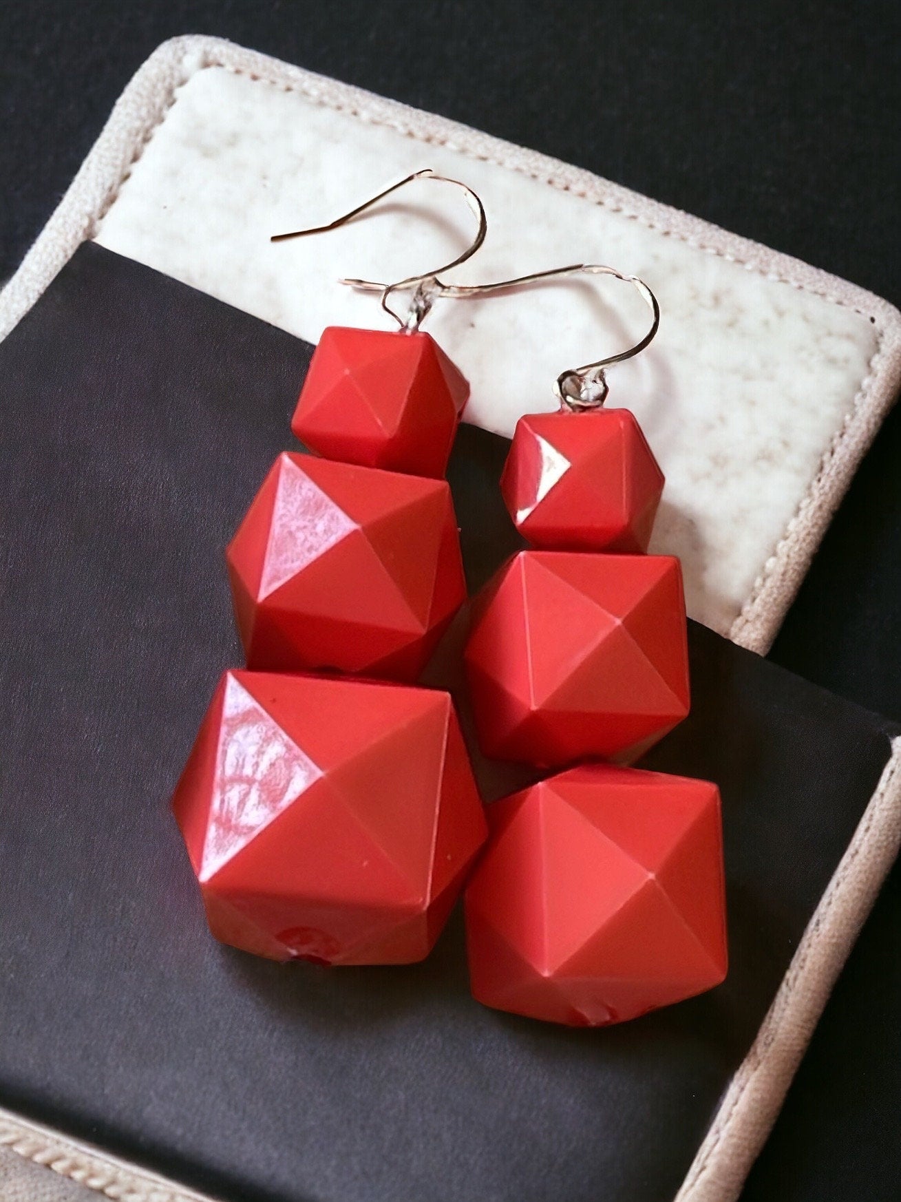 Your choice of coral or black faceted dangle earrings