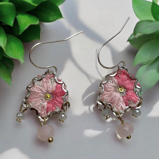 Handmade shades of pink mixed media earrings made with embroidery from a vintage linen table runner, combined with tiny dangles