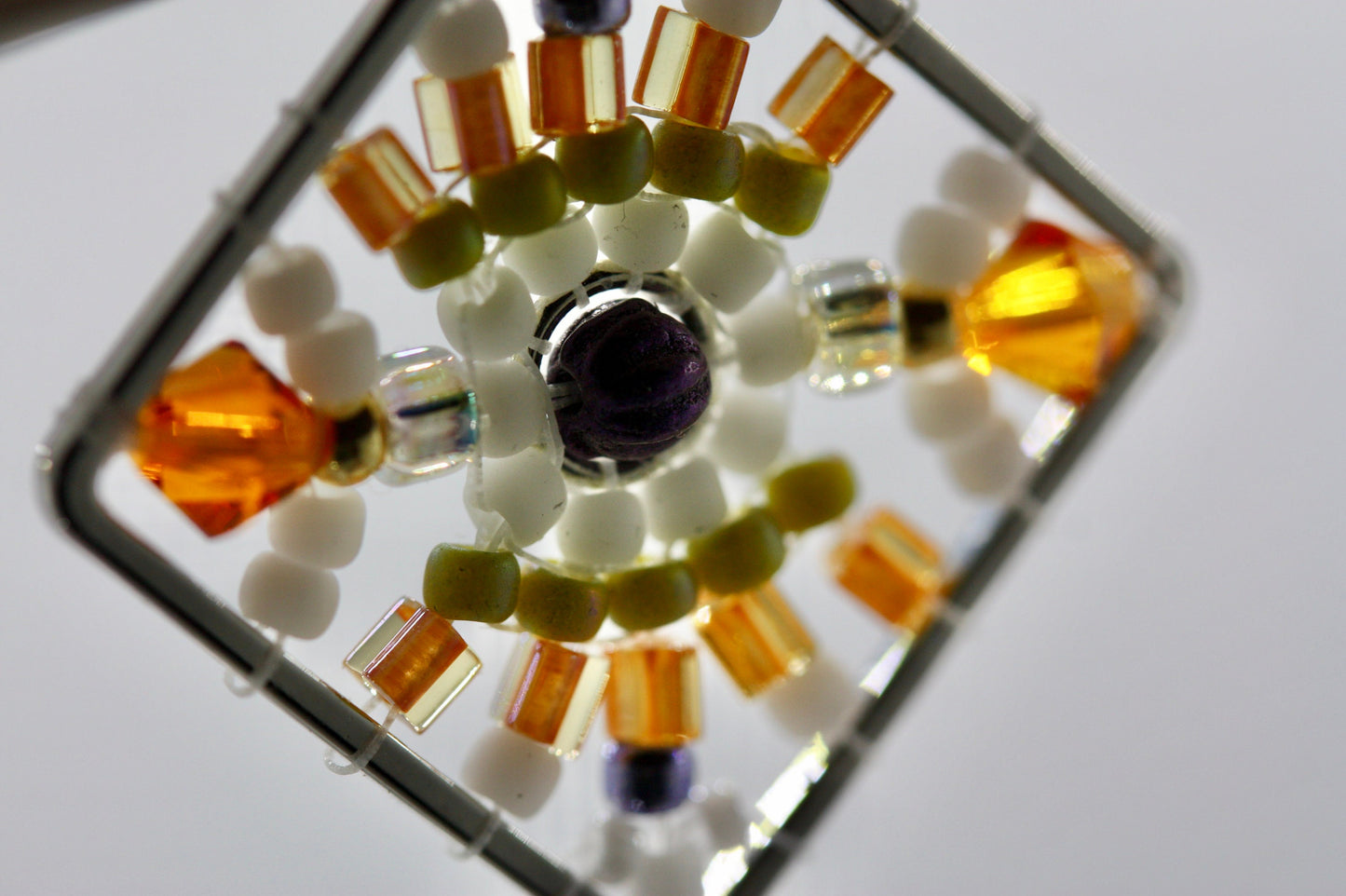 Orange, green, purple and white crystal and intricate beadwork small square dangle earrings