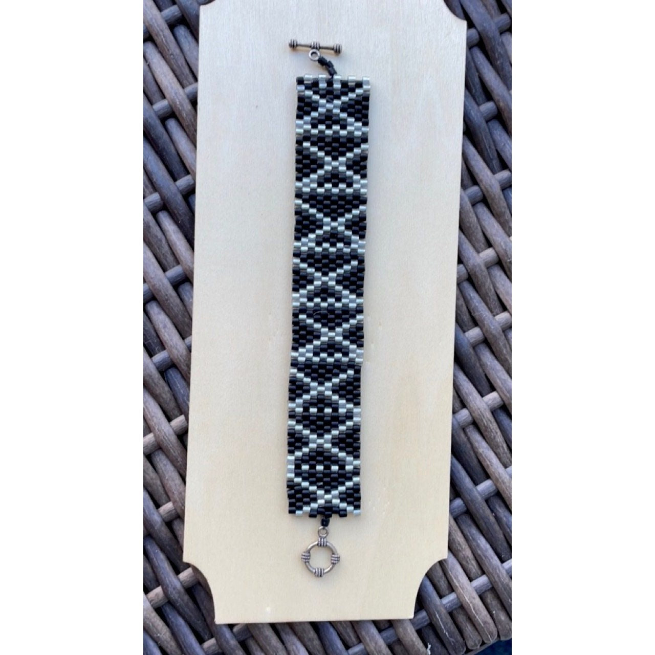 Stunning vintage silver and black hand woven vintage beadwork bracelet