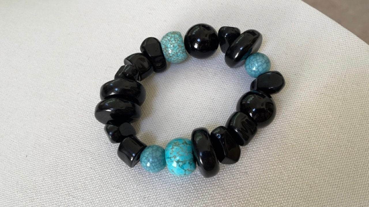 Stunning vintage mixed sizes and shapes of black and faux turquoise beaded bracelet