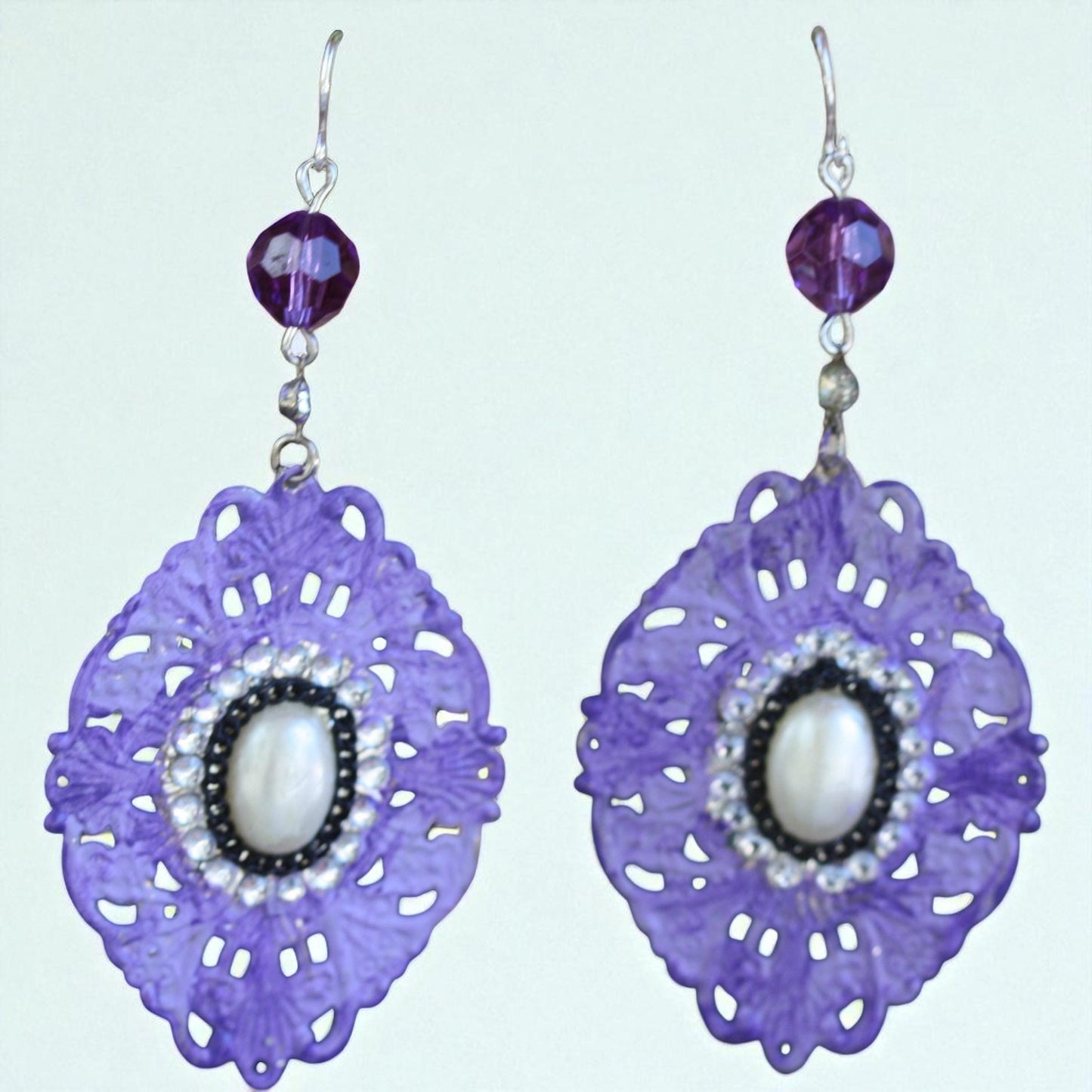 Purple, rhinestone and faux pearl mixed material dangle earrings