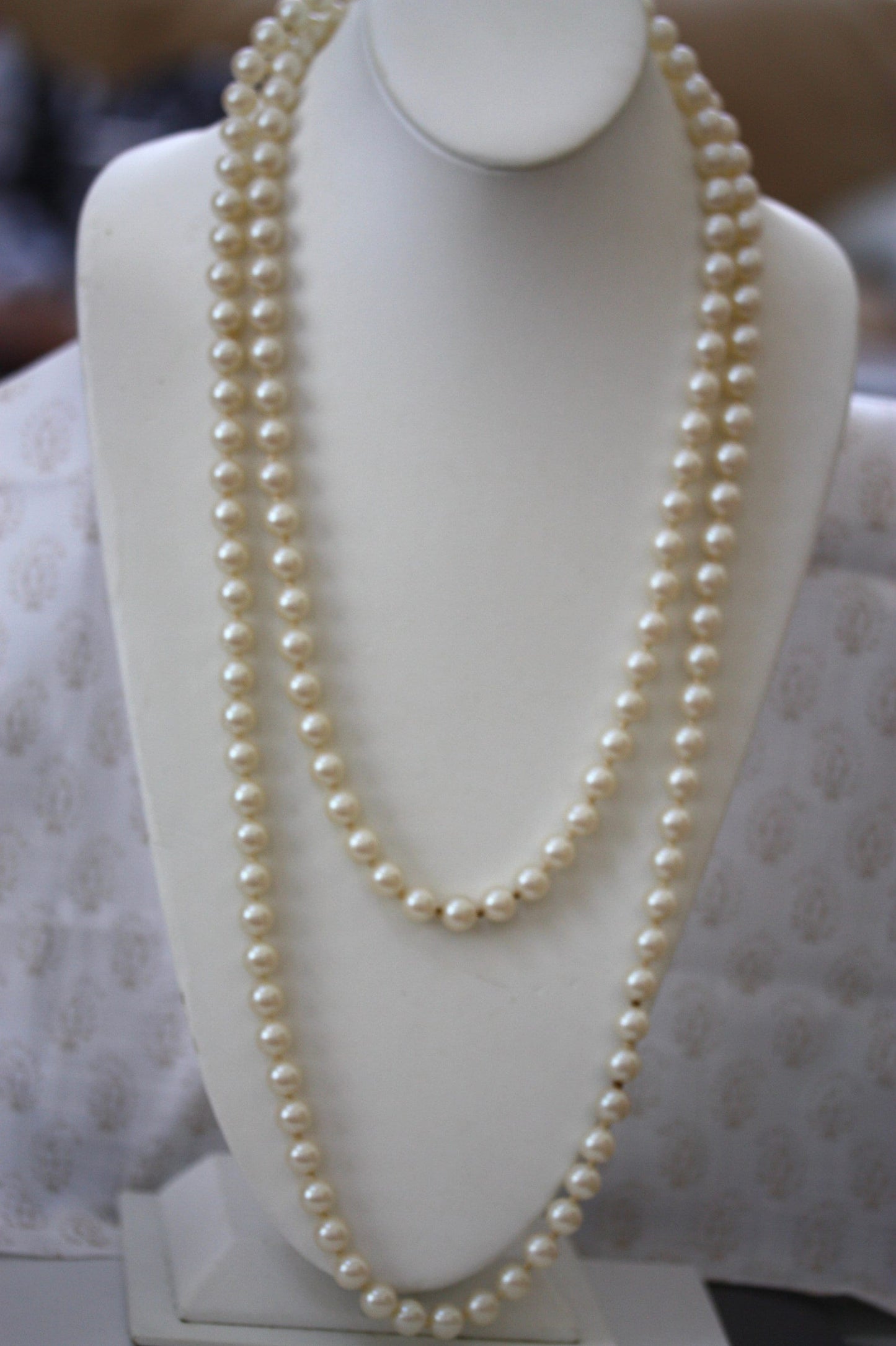 Vintage long double-stranded faux pearl necklace