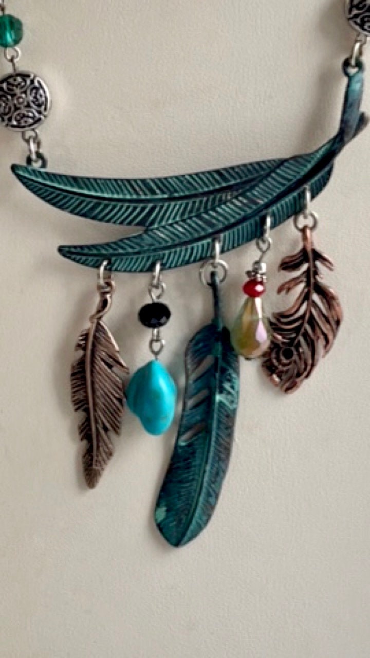 Mixed material feather and charm vintage artisan necklace