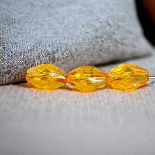 Orange oval faceted vintage beads - approx. 15 mm