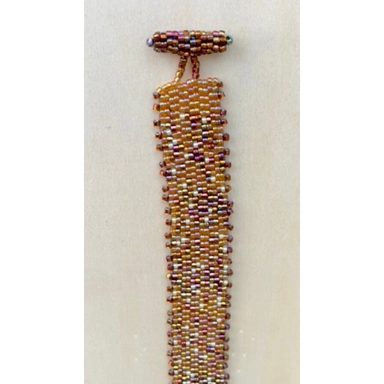 Stunning gold iridescent handmade beadwoven vintage beadwork bracelet with hand beaded toggle closure