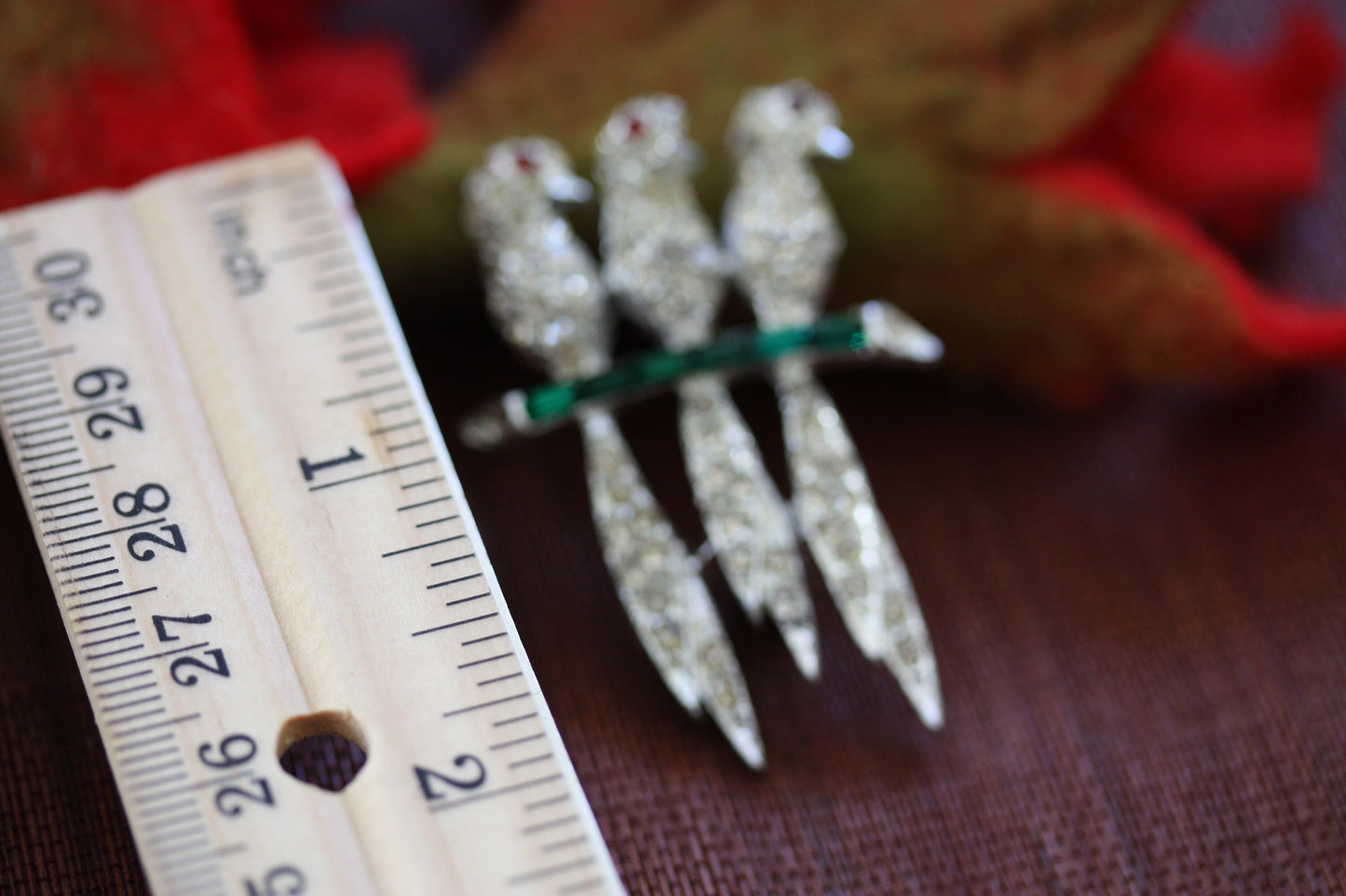 Stunning vintage pin - 3 rhinestone studded birds on a green crystal baguette branch