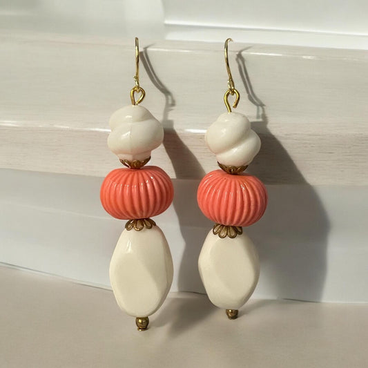 Handmade dangle earrings - vintage orange melon bead combined with free form cream colored vintage beads