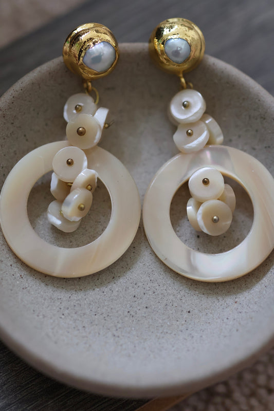 Very unique cream colored mother of pearl shell rounded hoop dangle earrings