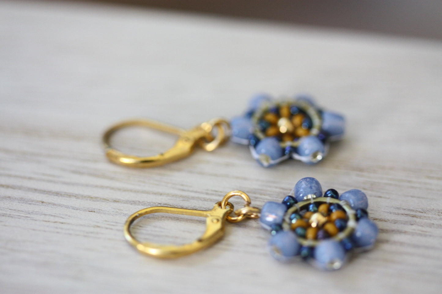 Tiny little dangles hand beaded seed bead  earrings - shades of blue and gold with goldtone center