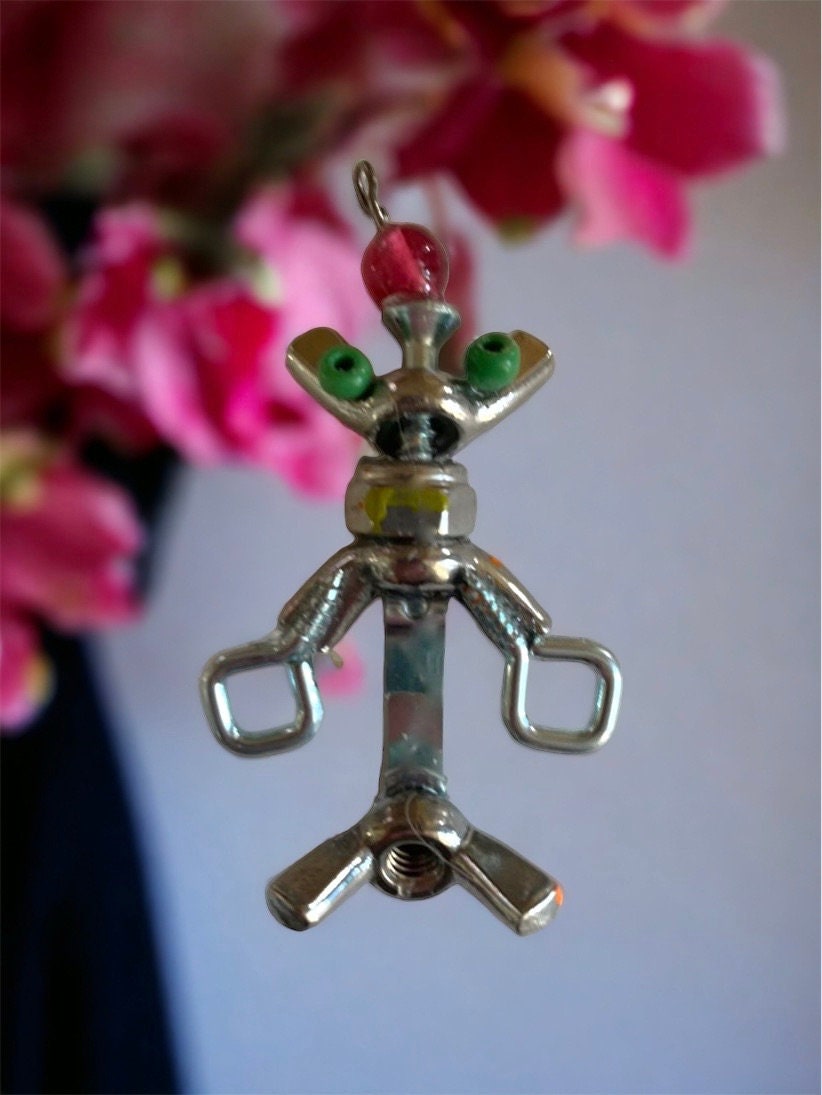 Meet "Herman" -  mixed media robot made of hardware - nails, screws, bolts with small wood/glass embellishments - pin or necklace pendant