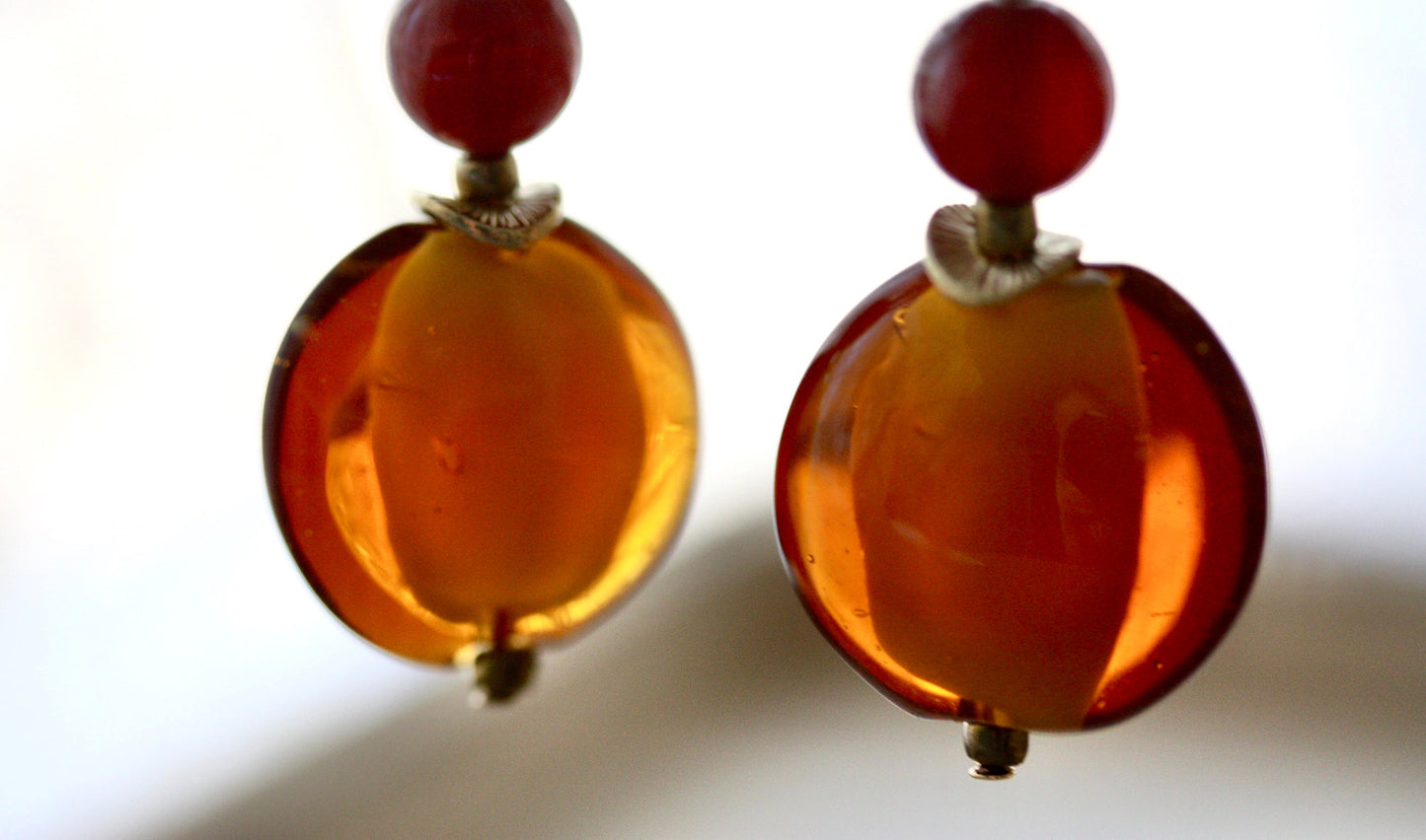 Orange and deep red dangle earrings