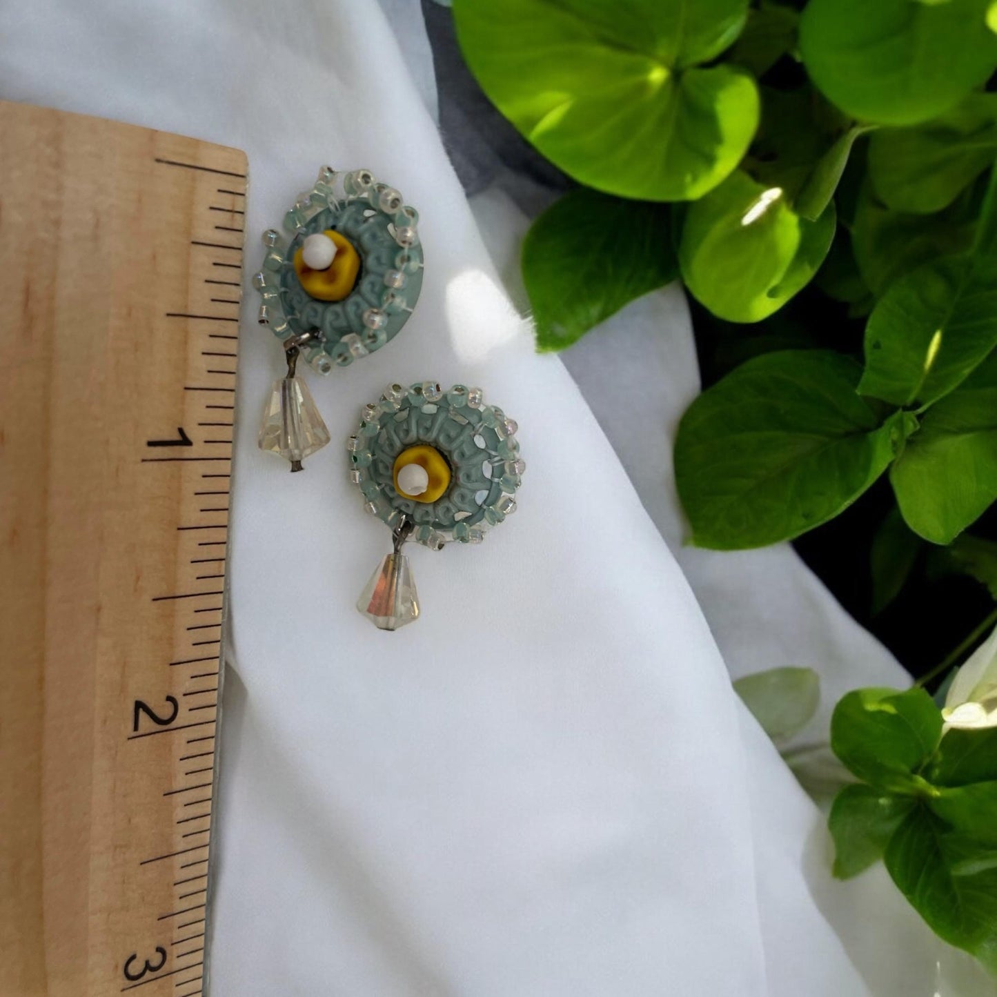 Stud earrings made of hand beaded vintage buttons with crystals