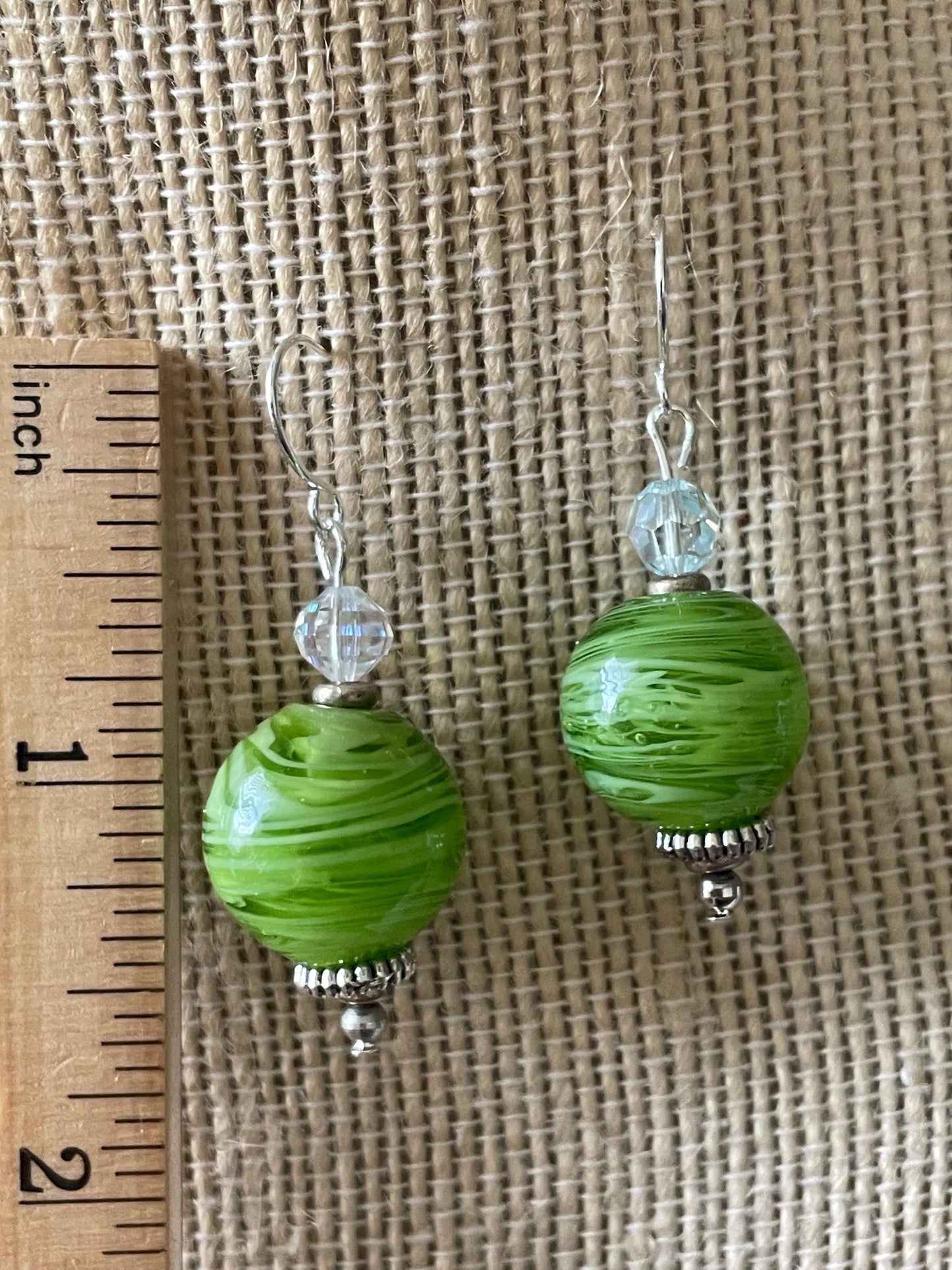 Green swirled fused glass and Swarovski crystal dangle earrings
