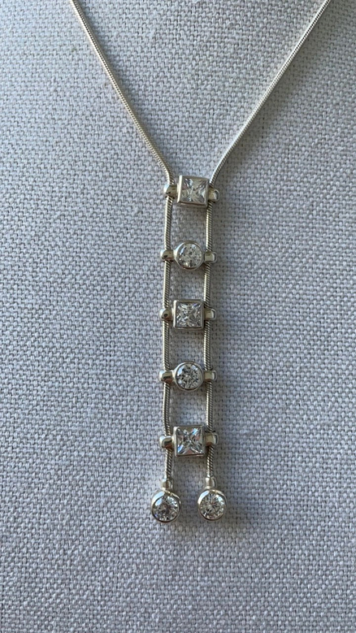 Vintage Monet couture sterling silver and clear geometric Swarovski crystal drop necklace