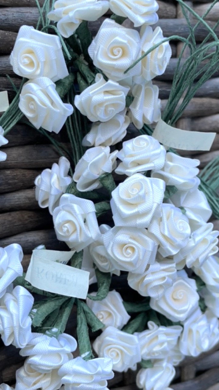 Three dozen individually wire stemmed faux flowers - available in 3 colors - yellow, cream or white