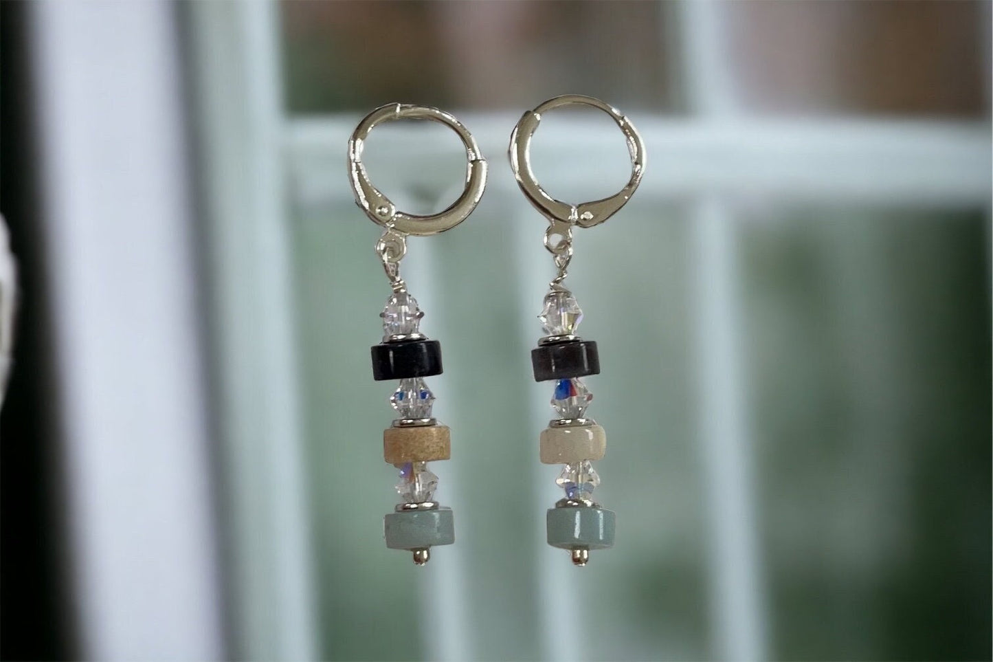 Handmade dangle earrings - turquoise, cream and black stone interspersed with Swarovski crystals - huggie ear wires